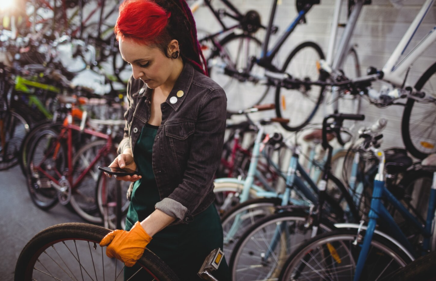A girl is buying a bicycle rack